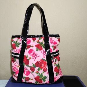 Betsey Johnson tote bag pink roses and skulls black patent leather handles